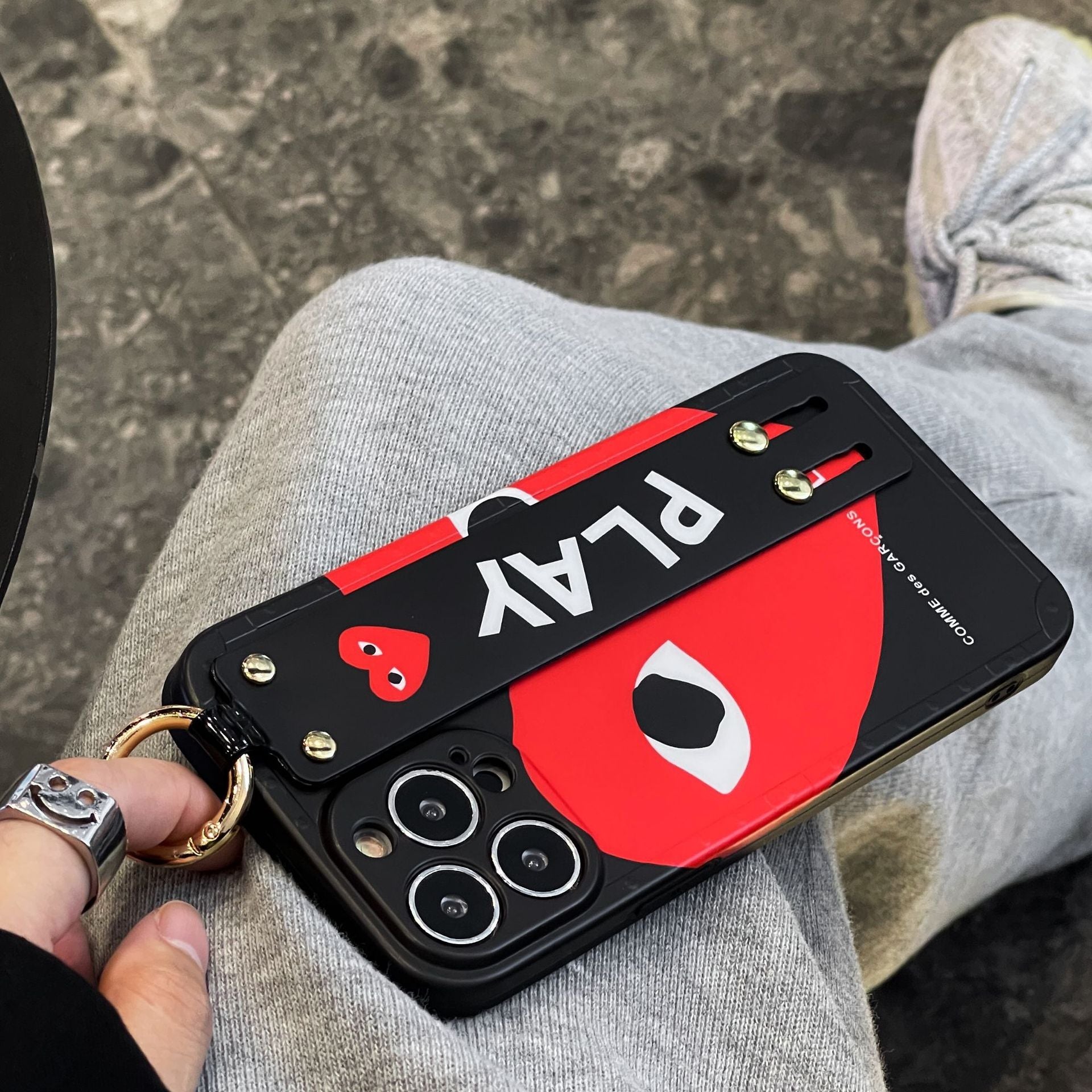 CDG iPhone Case with Wrist Strap Holder